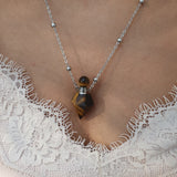 Strieborný náhrdelník s fľaštičkou z prírodného kameňa Tiger Eye